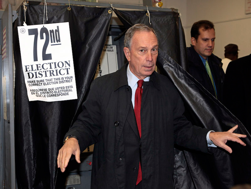 Photo of a man leaving a Shoup Lever Machine booth. Via AP.